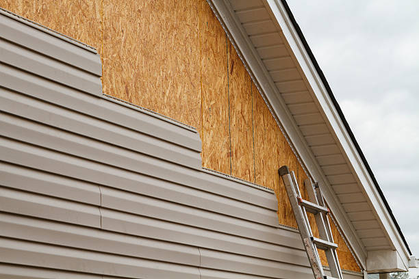 Professional Siding Replacement technician working in Sunbury, PA